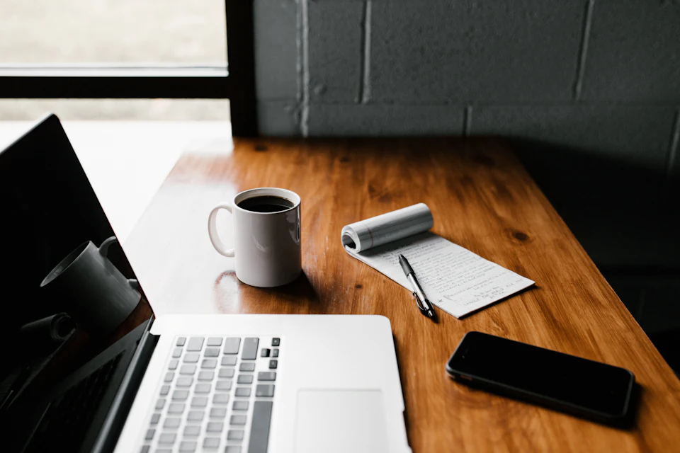 Overtime Pay Calculator: photo of a professional reviewing workplace documents and policies